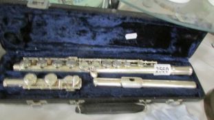 A cased Boosey & Hawkes 'B & H 400' flute.