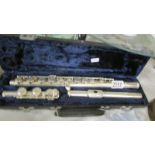 A cased Boosey & Hawkes 'B & H 400' flute.