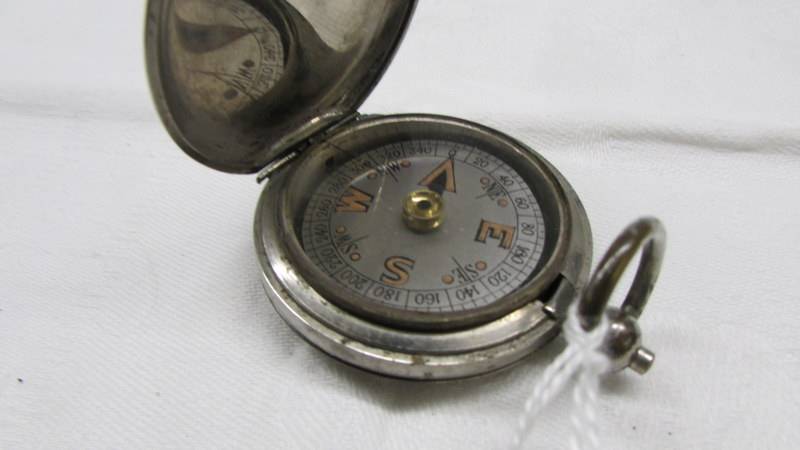 A WW2 era compass. - Image 2 of 2