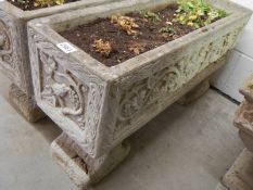 A garden planter with decoration on sides, 17 x 80 x 44 cm high. COLLECT ONLY.