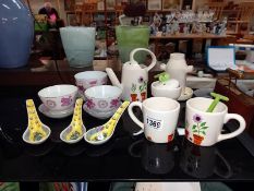 A quantity of Chinese bowls, spoons & 'Whittard' of Chelsea garden themed pottery items
