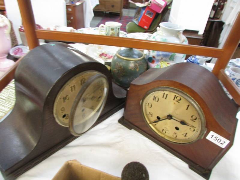 Two old mantel clocks.