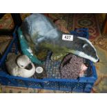 Six garden ornaments including a badger, COLLECT ONLY.