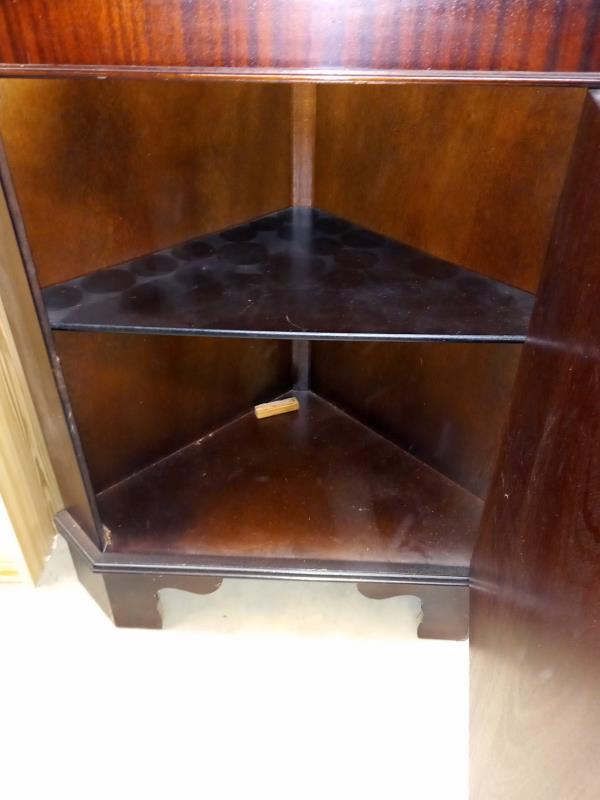 A dark wood stained corner cupboard with cut glass door panel 70 cm x 49cm x height 184 cm. - Image 2 of 2