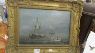A framed oil on canvas seascape.