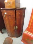 A 19th century oak corner cupboard. COLLECT ONLY.