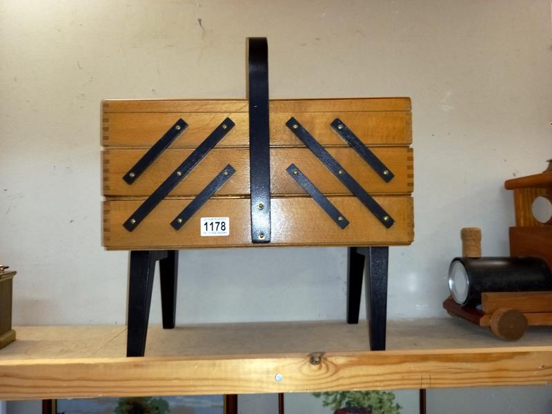 A vintage concertina sewing box