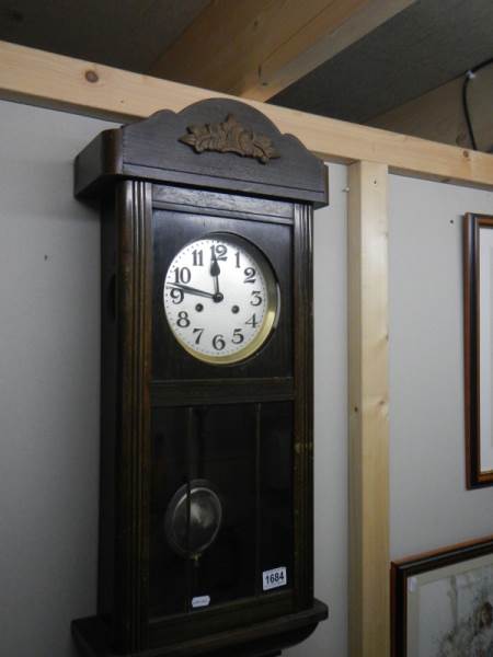 An 8 day mahogany wall clock with pendulum, 78 cm high, COLLECT ONLY. - Image 2 of 2