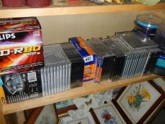 A large lot of unused DVD-R CDRW and DVD-RW discs.