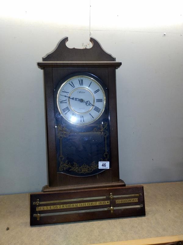 A Windsor quartz wall clock and snooker score board