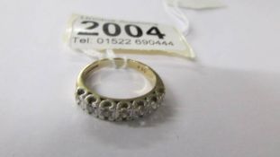 A yellow gold half eternity ring set diamonds, size L, 3.3 grams.