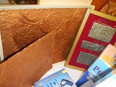 Two beaten copper panels (45 x 36cm and 26 x 36cm) and three framed metal panels. COLLECT ONLY.