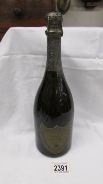 A bottle of vintage 1980 Moet Et Chandon champagne.