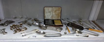 A good lot of silver plate cutlery including serving spoons & sets of 6 spoons etc.