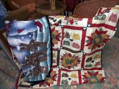 A modern patchwork pattern quilt and a Christmas fleece blanket.