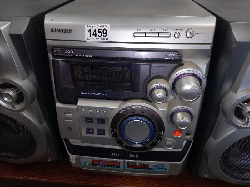 A Samsung stereo with speakers, 3 CD changer player, radio tuner & double tape deck (model - MAX- - Image 2 of 2