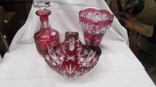 A Bohemian glass decanter, vase and basket.