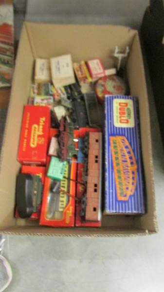 A Hornby Triang 00 gauge Lord of the Isles, Dinky 051 & 053 passengers, station staff etc.,