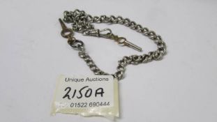 A silver watch chain with two keys. 33 grams.