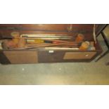 An old Croquet set in a wooden box. COLLECT ONLY.