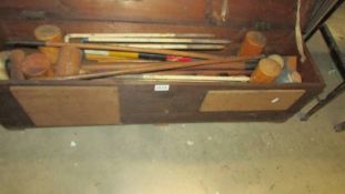 An old Croquet set in a wooden box. COLLECT ONLY.