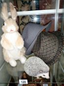 A hare, hedgehog & 2 hats