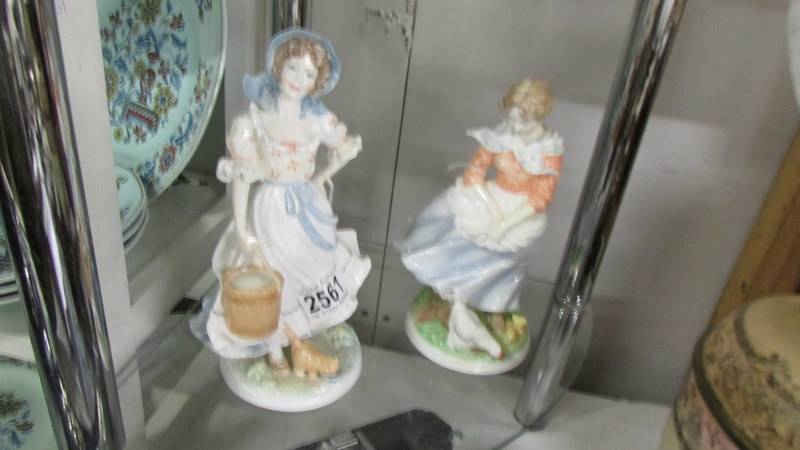 Two Royal Worcester Old Country Ways figures - A Farmer's Wife and The Milkmaid.