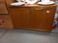 A low 2 door cabinet or TV stand by J Sakol, 78cm wide x 48cm deep x 56 cm tall, COLLECT ONLY.