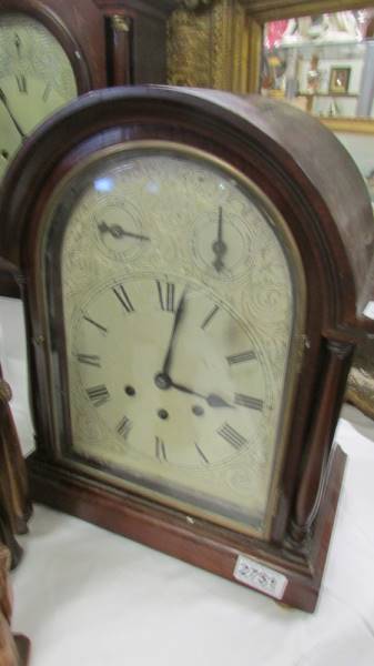 A mahogany 8 day bracket clock. In working order.