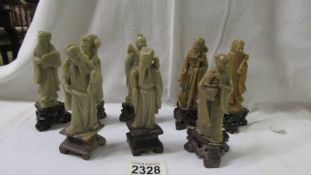 8 Carved soapstone Chinese figures possibly the 8 immortals in Taoise Pantheon. (1 a/f)