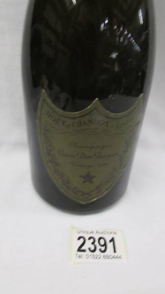 A bottle of vintage 1980 Moet Et Chandon champagne. - Image 2 of 2