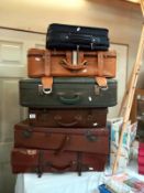 6 vintage suitcases