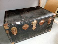 A good vintage studded travel trunk