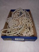 A good lot of pearl & faux pearl necklaces