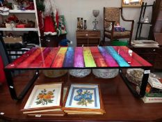 A multi coloured striped glass coffee table on metal base, COLLECT ONLY.