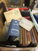 A box of stamp albums, cigarette cards etc.,