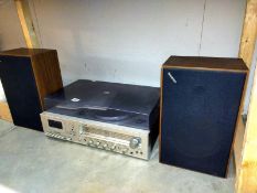 A Sharp SG-220E stereo music centre with speakers