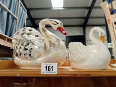 An aged vintage swan & 1 other