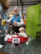 A Wallace and Gromit figure car shampoo.
