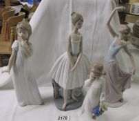 Four NAO by Lladro including rarer examples.