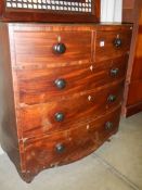 A two over three bow front chest of drawers, COLLECT ONLY.