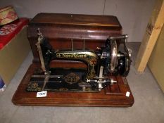 An ornate cased Frister Rossman sewing machine COLLECT ONLY