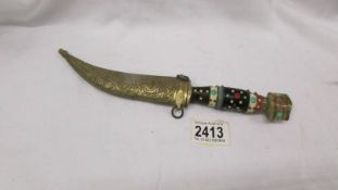 A vintage Turkish dagger in sheath.