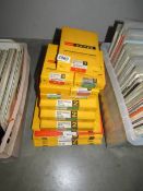A quantity of new, old stock, Kodak photographic paper in various sizes.