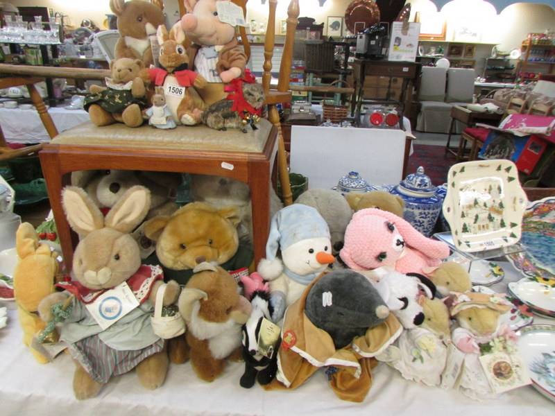 A good lot of soft toys including Beatrix Potter.