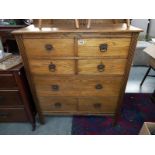 An Edwardian oak seven drawer chest with iron handles. 95cm x 45cm x height 110cm. COLLECT ONLY