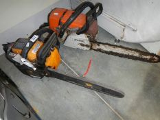 Two 12" petrol chain saws, COLLECT ONLY.