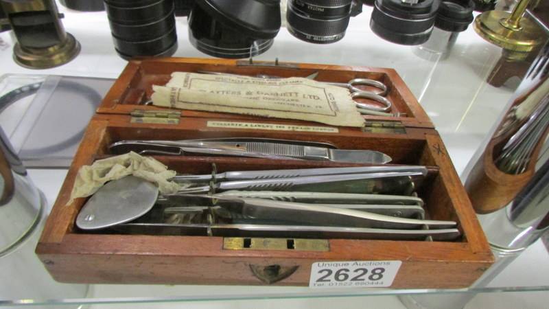 A cased set of assorted instruments/tools.