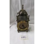An old electric brass lantern clock.