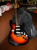 A Replica Fender Stratocaster guitar with soft case, COLLECT ONLY.